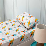 A kids bedroom showcasing a fully coordinated outer space theme bedsheet, including pillowcase.