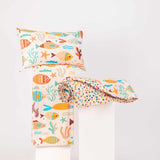 Under the Sea kids bedding set folded neatly showing comforter, bedsheet, and pillow cover with colorful aquatic prints