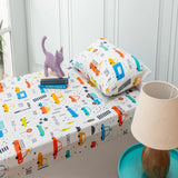 Kids bedsheet and pillow cover set featuring colorful transportation print with cars, buses, and traffic signs on a soft cotton fabric.