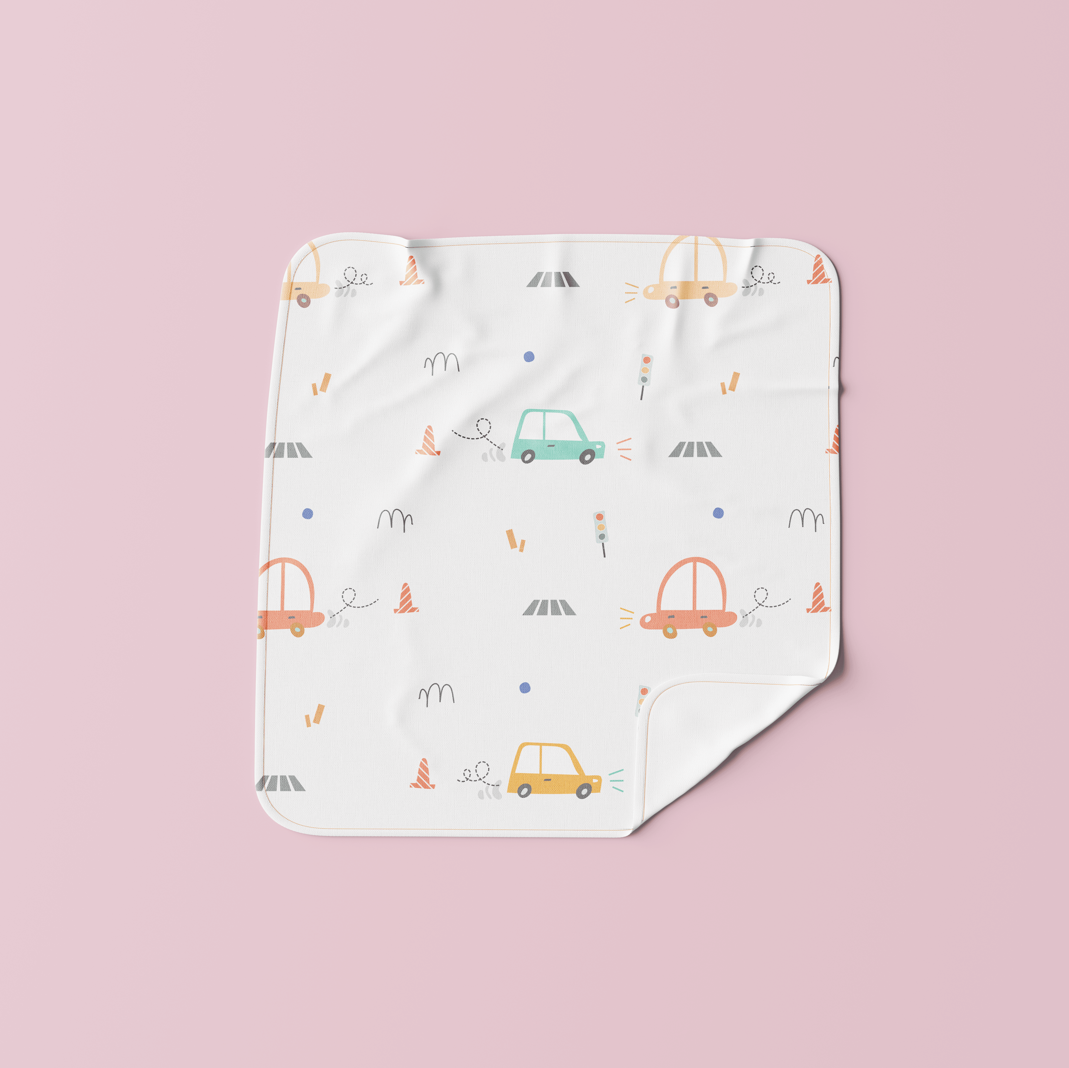 Muslin baby wipe featuring colorful car print – gentle, reusable cloth for babies.