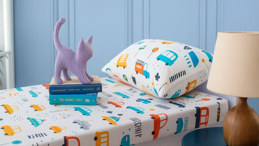 Kids bedsheet showing pillow cover and book and toy