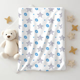 Close image of Muslin swaddle sheet with scattered star print.