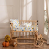 Outer space print baby cot sheet set with pillowcase and two bolster covers featuring stars, planets, and rockets on soft muslin fabric.